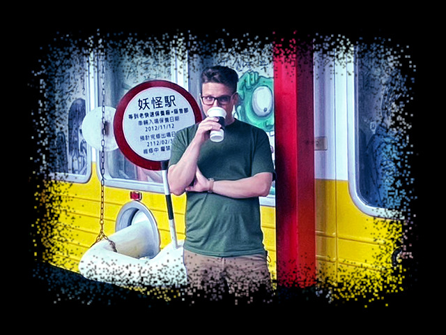 Jesse drinking
          coffee in Taiwan